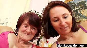 Hairy grandma toyed by busty mature lesbian